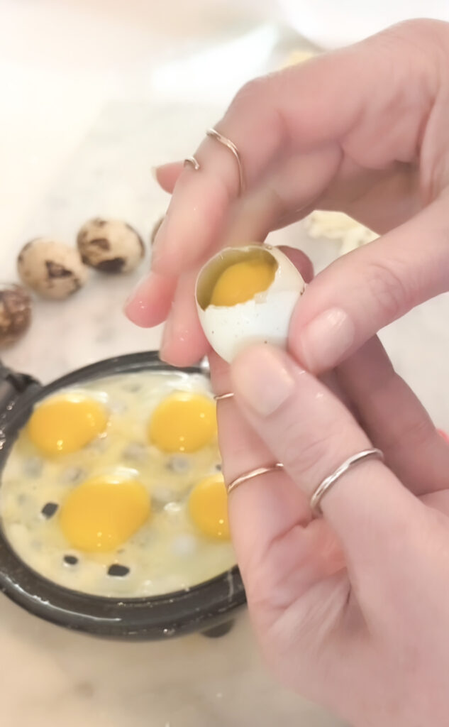 cracking eggs for waffle